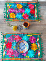 Colorful placemat (blue-red) with round floral embroidery from Mexico